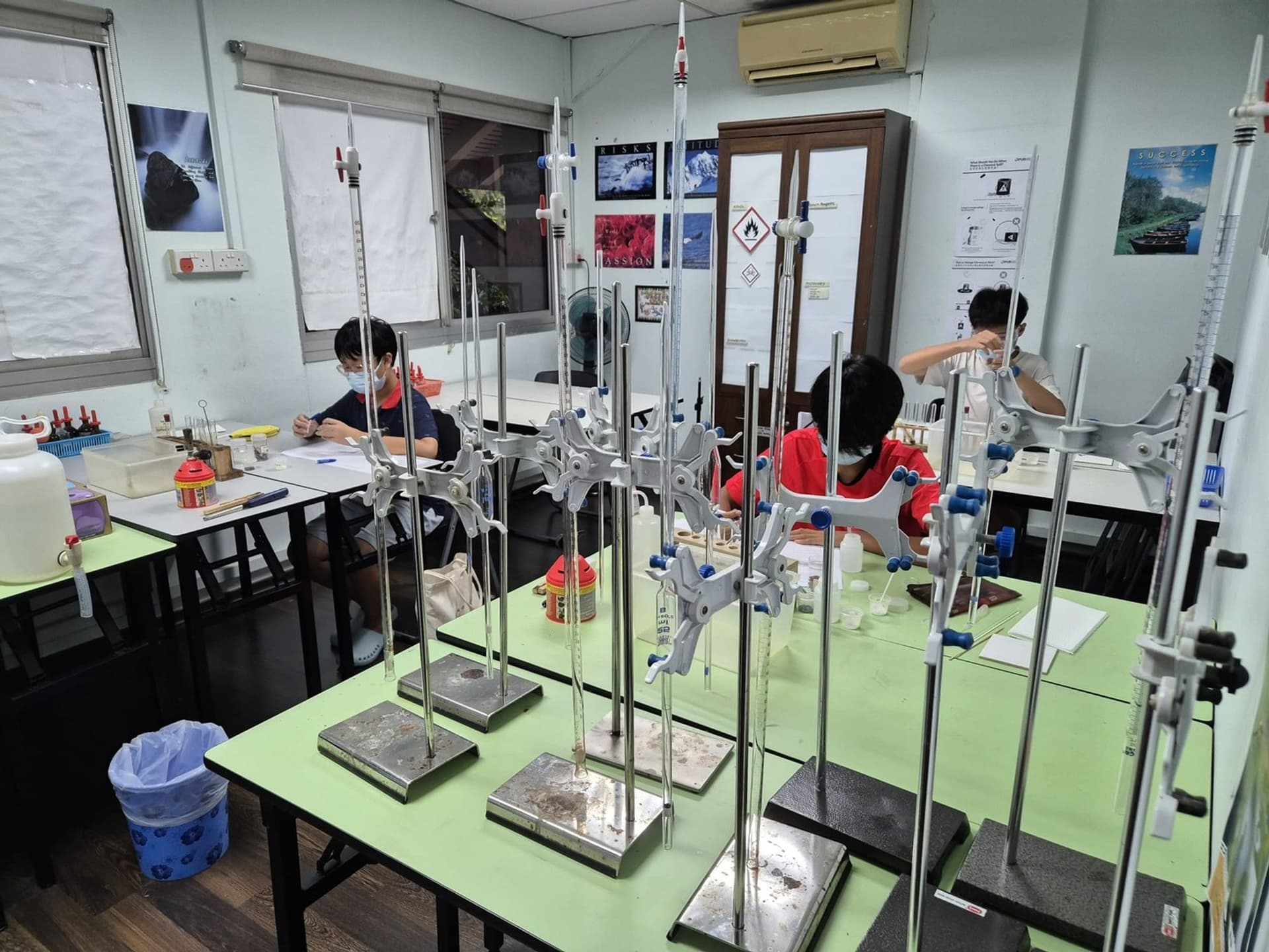 Students running a combined science practical routine