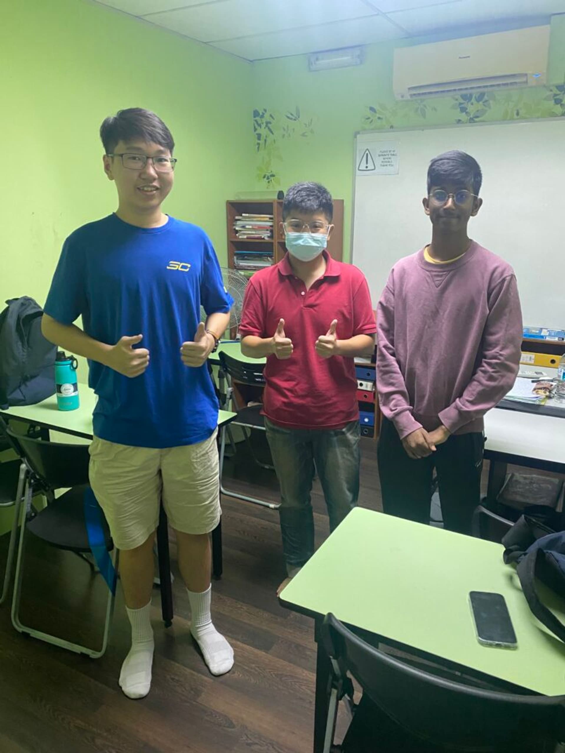 Students attending a small-group lesson in a classroom.